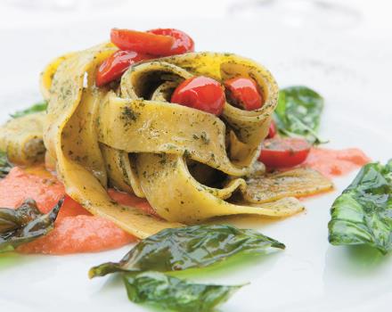 Homemade noodles with Basil and fresh tomatoes.